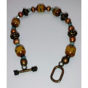 Boho Beaded Bracelet – Uranium Glass Glow, Amber Swirl & Bronze Toggle Clasp